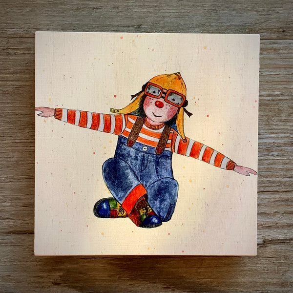 A clown in action - illustrations for the children's book on wood